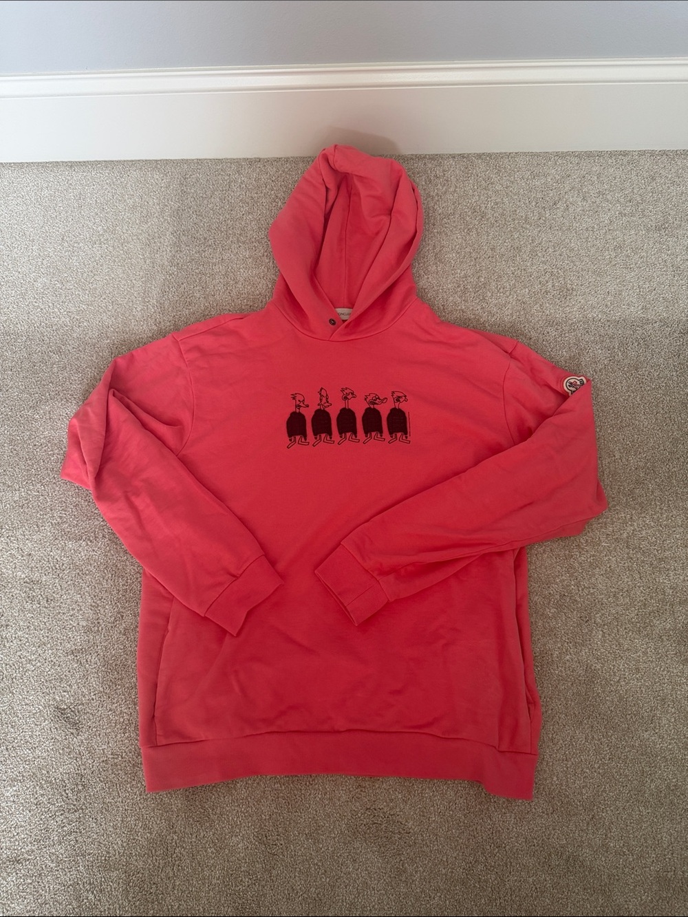 Moncler Coral Red Graphic Hoodie with Black Chest Motif